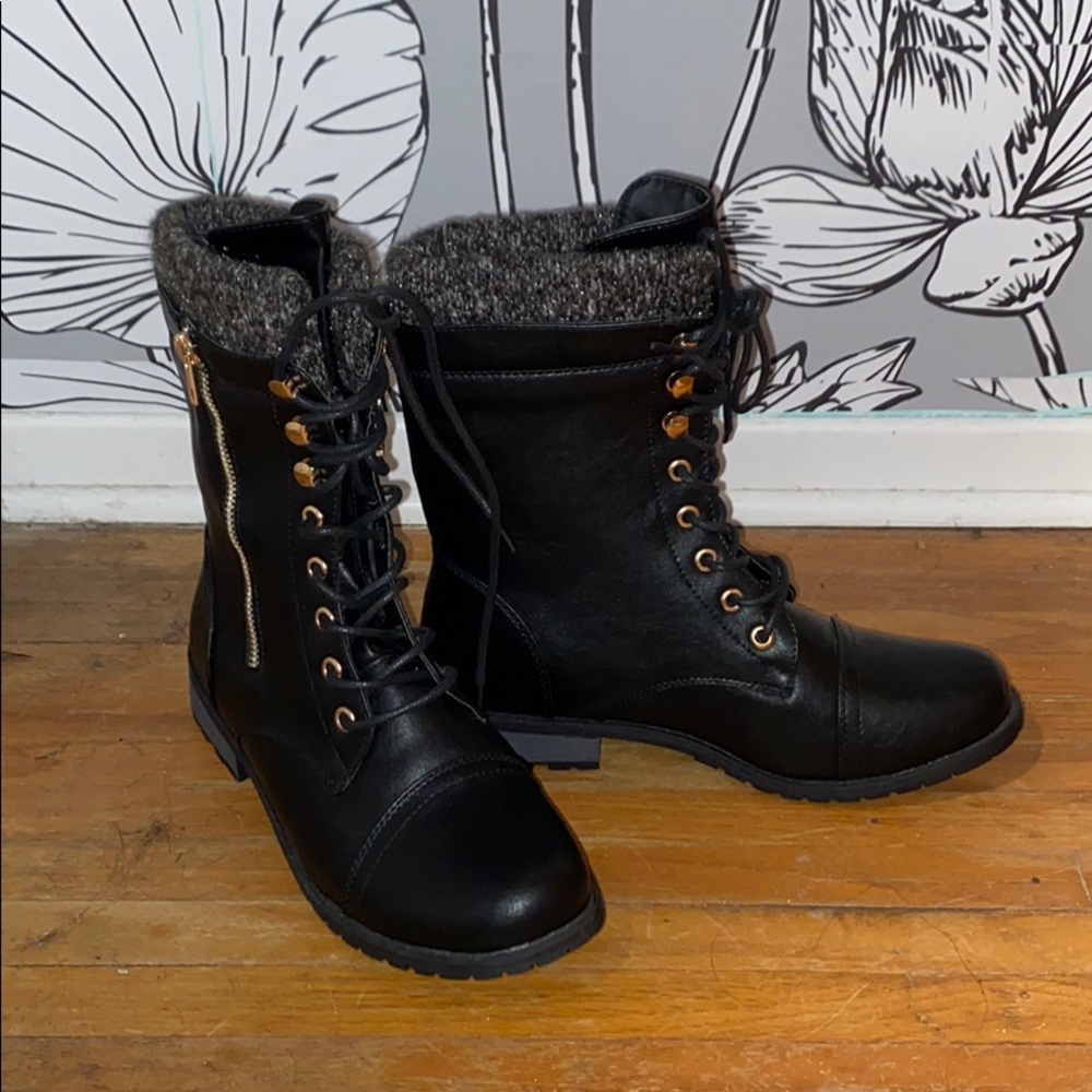Black combat boots with side zipper